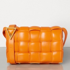 Bottega Veneta Padded Cassette Bag In Orange Calfskin